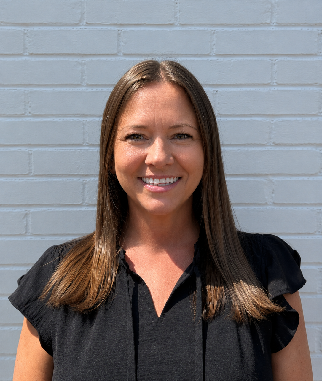 Julia Gustin, Firm Manager and Real Estate Paralegal at The Mroczko Firm, LLC
